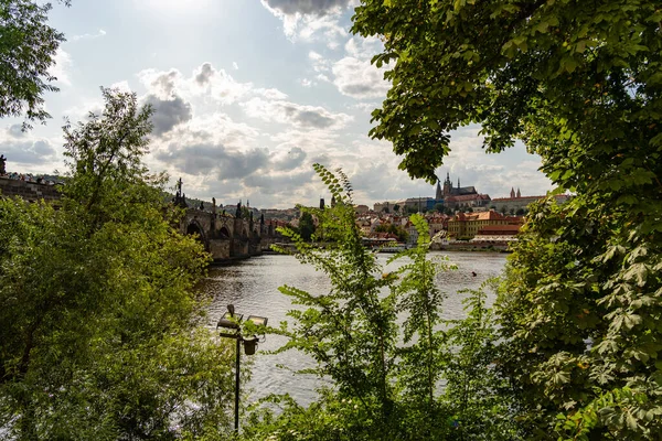 Scenic panorama cityscape view of Moldava river boat Prague in Czech Republic. — Stock Photo, Image