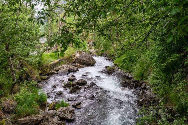 Waterfall in green forest, Andorra