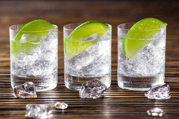 Three shots with gin and tonic — Stock Photo, Image