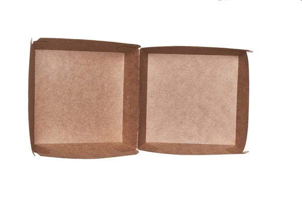 Ανοιγμένο κενό κουτί Κραφτ-χαρτιού για μπέργκερ που απομονώνεται σε λευκό φόντο, προβολή πάνω. — Φωτογραφία Αρχείου