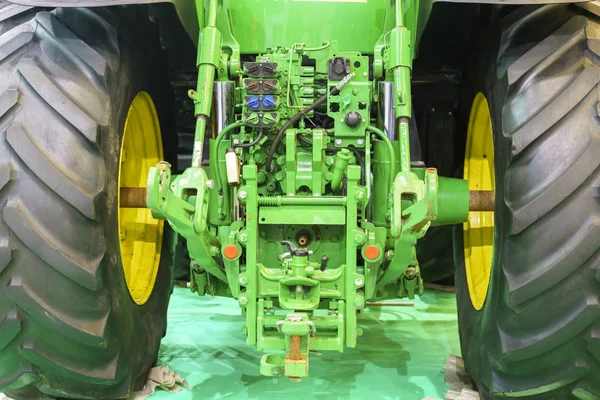 Agricultural machine for fertilizer application. Tractor for chemical treatment. Rear parking light. Fragment.
