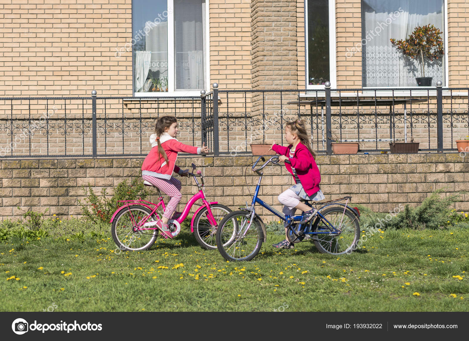 two girls on bike