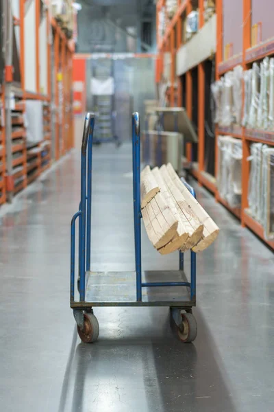 construction cart in the building store. Carts loaded with boards