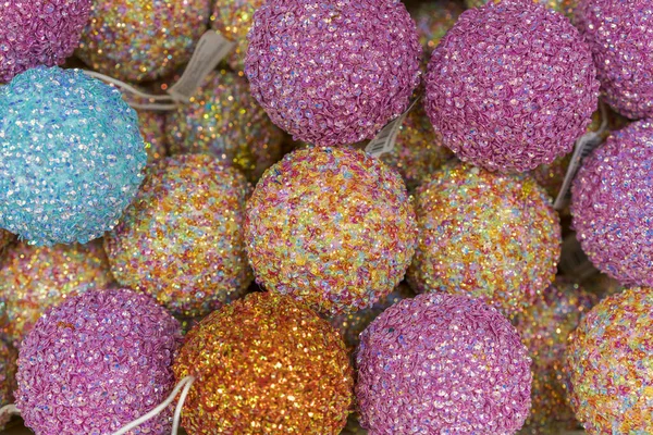 Christmas balls on festive winter market.