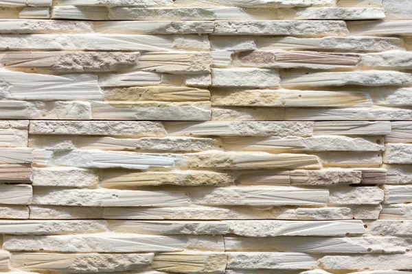 Beige decorative stone for decoration. Beige Stone Background.