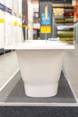 White bathtub in hardware store.