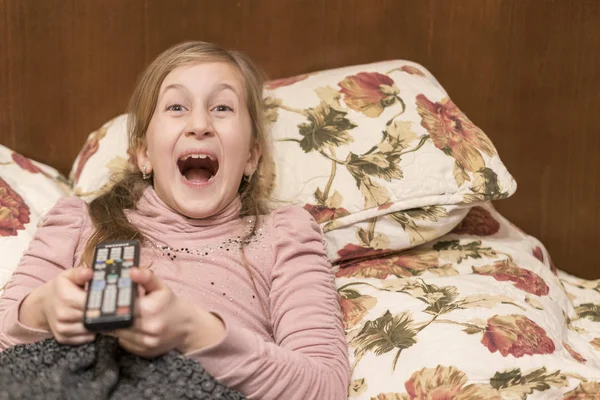 Little Girl Watching Lying Bed Remote Control — Stock Photo, Image