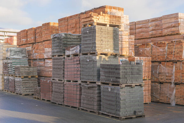 pallets with bricks in the building store