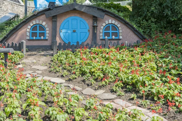 stock image Kiev, Ukraine - Juny 20, 2019: The little hobbit house. Themed flowerbed in the park.