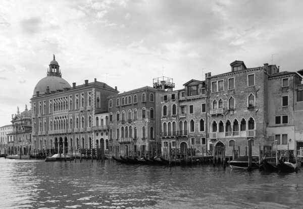 Sleepy boats on the Grand Canal. Summer Morning in Venice