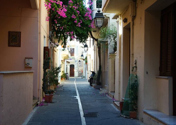 A gentle summer morning on a narrow street in Rethymno, Greece