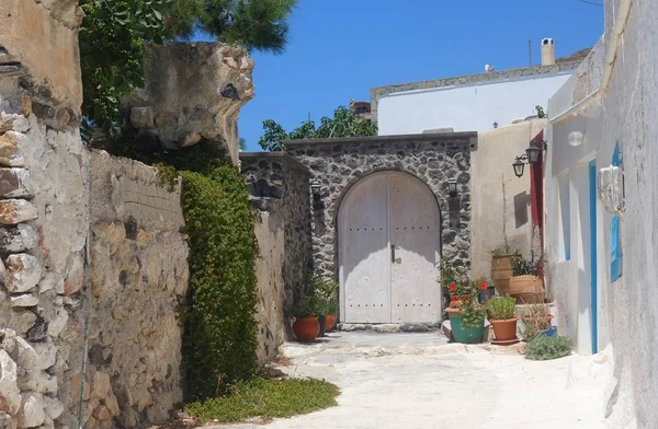 Sunny hot day on a narrow street in Emporio