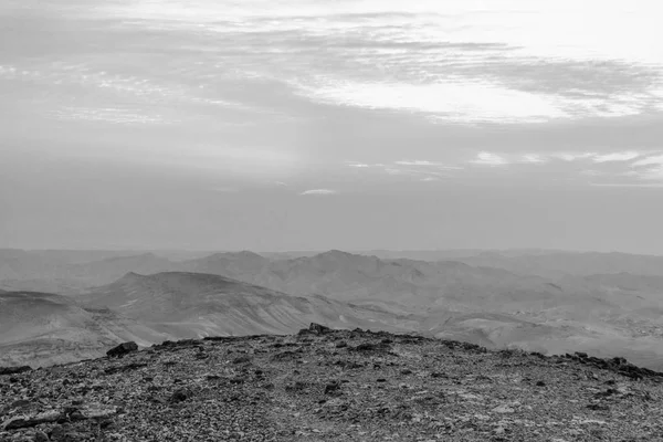 White and black landscape of magic sunrise over israel judean desert