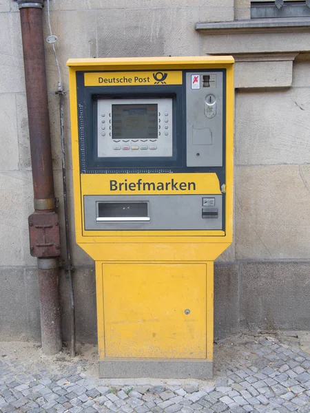 Old yellow stamp-machine, German post — Stock Photo, Image