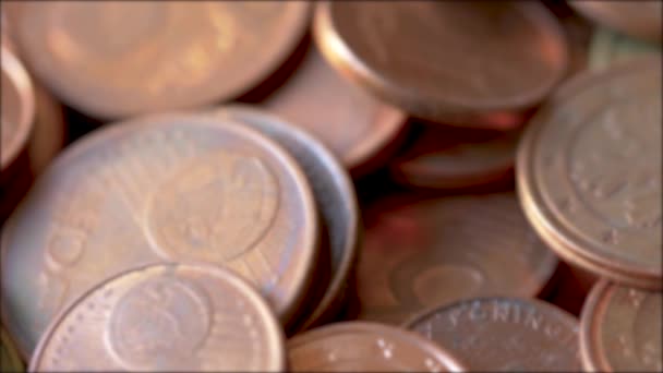 Close-up of Rotating Bronze Euro Coins, Blurry Background — Stock Video