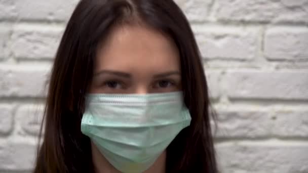Attractive Brunette Girl Long Hair Brown Eyes Protective Medical Mask — Stock Video