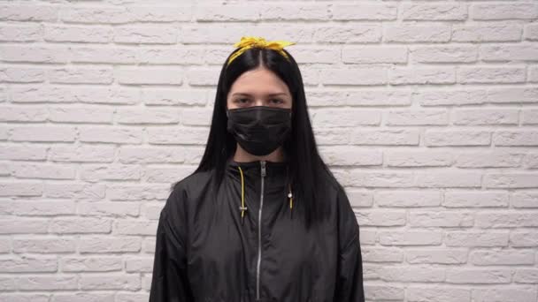 Handsome Caucasian Young Woman Black Jacket Yellow Headband Protective Medical — Stock Video