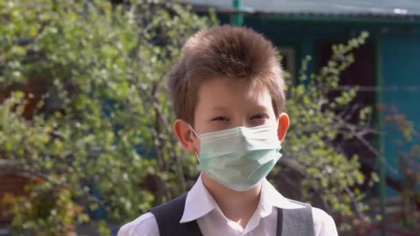 Young Beautiful Kid White Shirt Gray Vest Takes Medical Protective — Stock Video