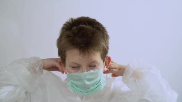 Beautiful Young Cute Blonde Kid Short Hair Protective Suit Put — Stock Video