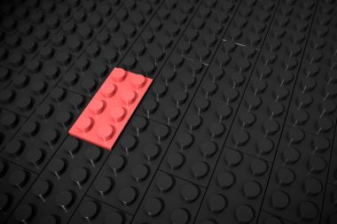 3D çizim: kırmızı farklı oyuncaklar parça yalan ayrı ayrı üzerinde siyah bir arka plan oluk eklenir. İş kavramı: benzersiz, herkes gibi değil. küp çocuk plastik aleti seti.