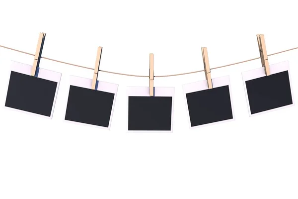 stock image 3d illustration: five photographs of the old type with a black film hang on the clothesline fastened with wooden clothespins. Isolated on white background. Retro. concept.