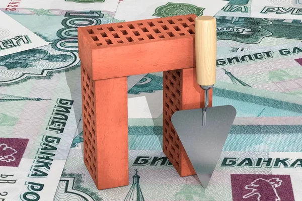 Rode bakstenen gestapeld in een stapel met een troffel geïsoleerd op roebel bankbiljetten achtergrond — Stockfoto