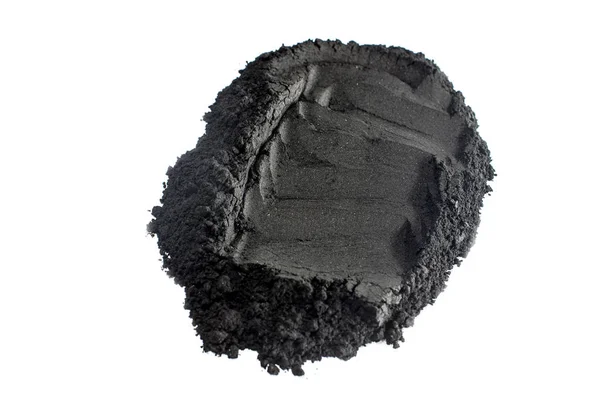 Activated charcoal powder shot with macro lens — Stock Photo, Image