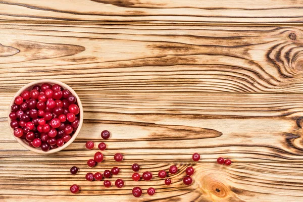 Cranberry. Cranberries on glay Plate Wooden Background — Stock Photo, Image