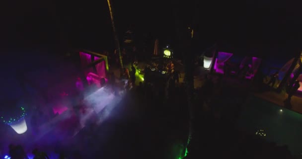 Party on club in Goa, India. Aerial view. Night — Stock Video