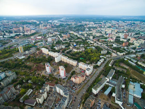 Aerial view of city Ufa from traffic, buildings, river, forest — Stock Photo, Image