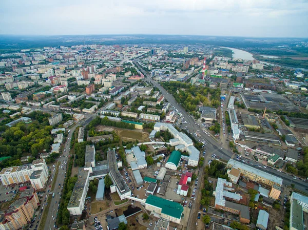 Aerial view of city Ufa from traffic, buildings, river, forest — Stock Photo, Image