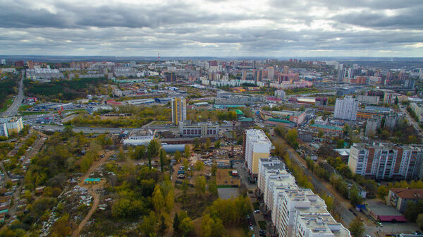Typical city of Russia at sunset in center. Aerial view
