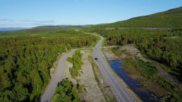Norwegian road in the mountains. Aerial view — Stock Video