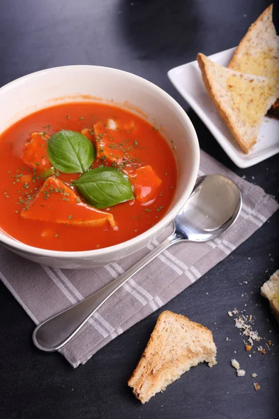 Tomatoes soup with bread — Stock Photo, Image