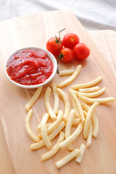 French fries with tomato sauce — Stock Photo, Image