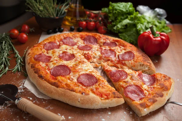 Salami pizza on the table — Stock Photo, Image