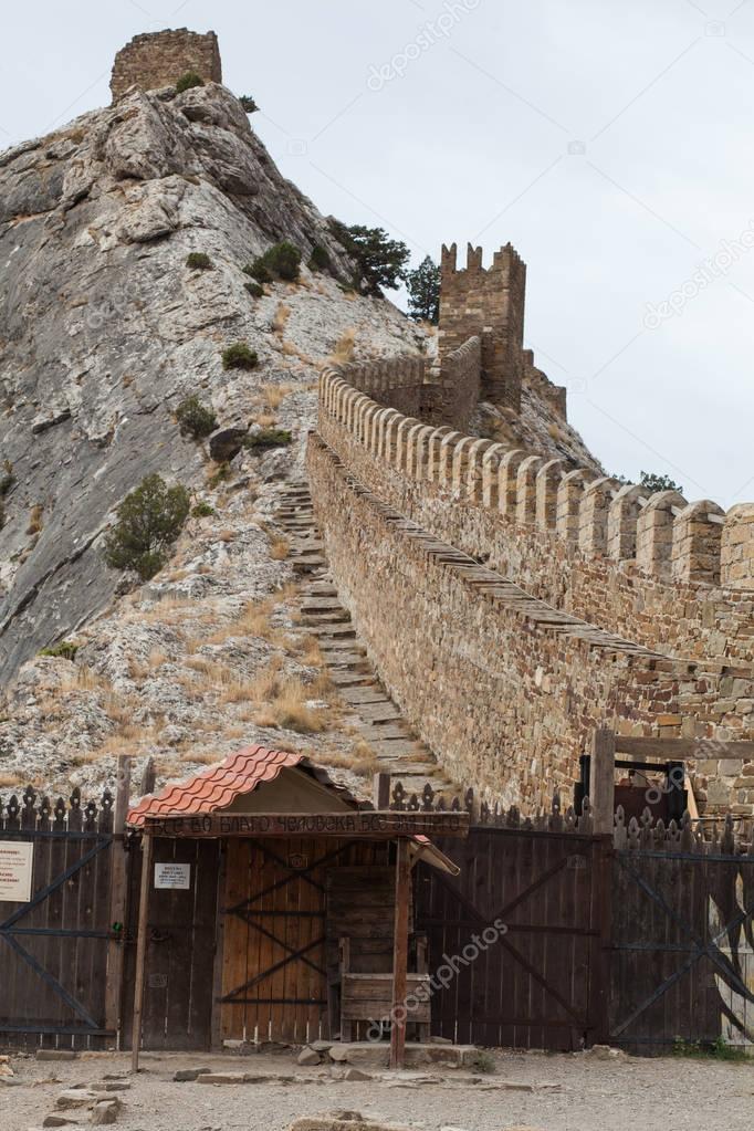 October 16, 2017: Tourists visits Towers and walls of The Genoese Fortress in Sudak, Museum-reserve Sudak fortress , Crimea