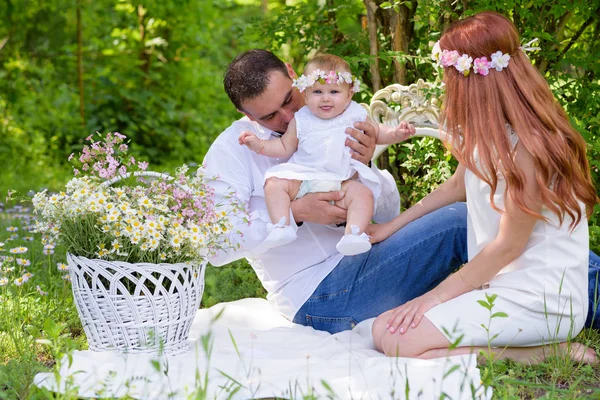 Family portrait outdoors picnic