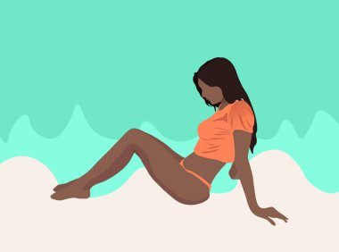 Tanned black girl relaxing on shore of the ocean at the beach. Blue water