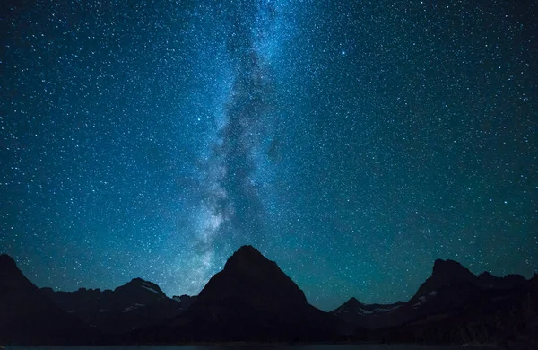 Swiftcurrent Lake  at night with star in Many Glacier area ,Montana's Glacier National Park,Montana,usa.