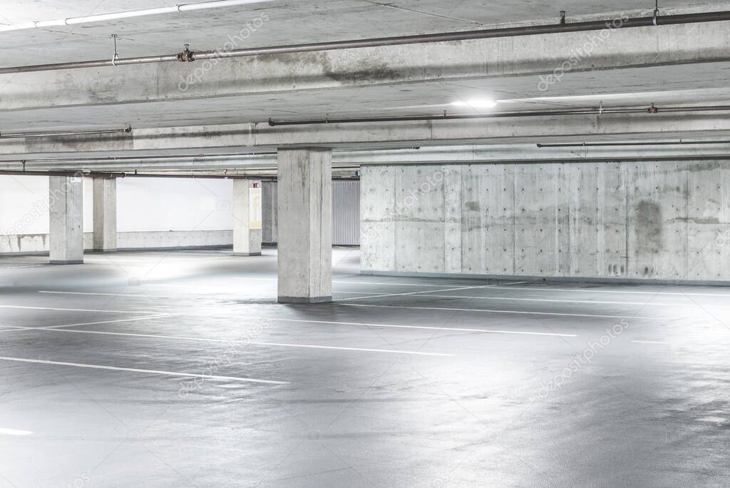 scene of empty cement Parking Garage interior in the mall..