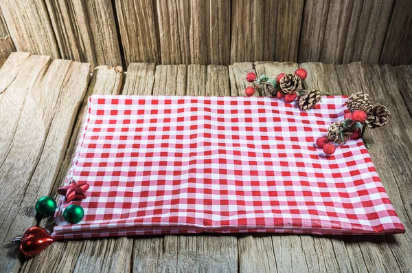empty wooden table top with red chess napery Ready for product display montage..