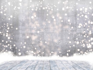 Kar yağarken boş beton ve ürün görüntüleme montajına hazır kar ile buz ahşap masa..