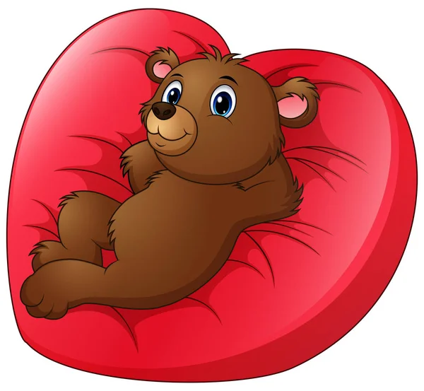 Orso dei cartoni animati rilassarsi sul letto a forma di cuore — Vettoriale Stock