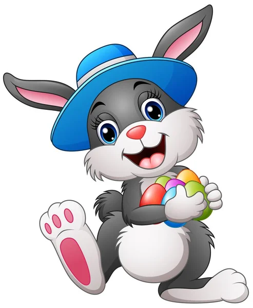 Happy easter bunny wearing a hat carrying eggs — Stock Vector