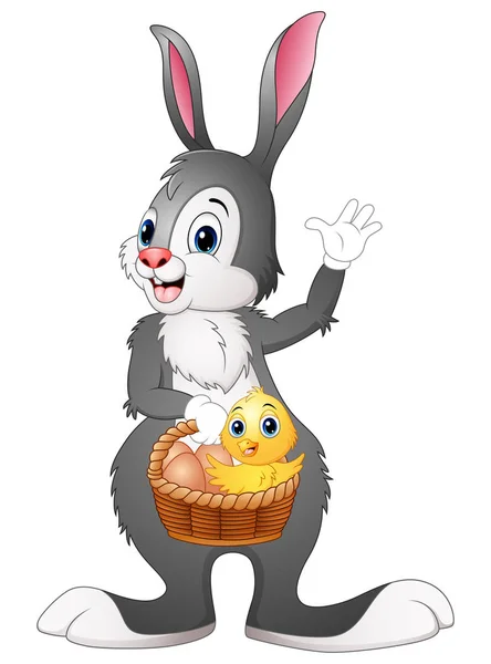 Coelho de Páscoa segurando uma cesta com ovo de Páscoa e pinto —  Vetores de Stock