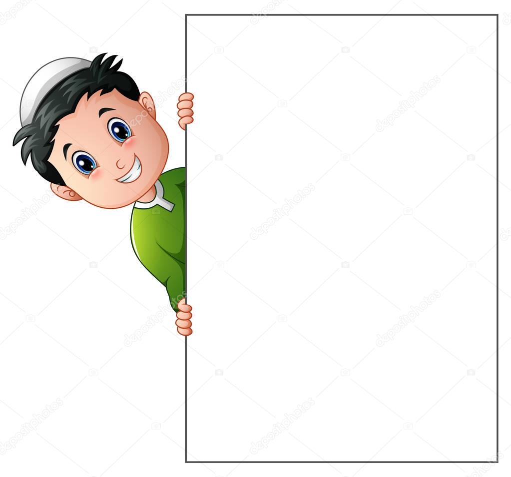 Happy muslim boy cartoon holding blank sign