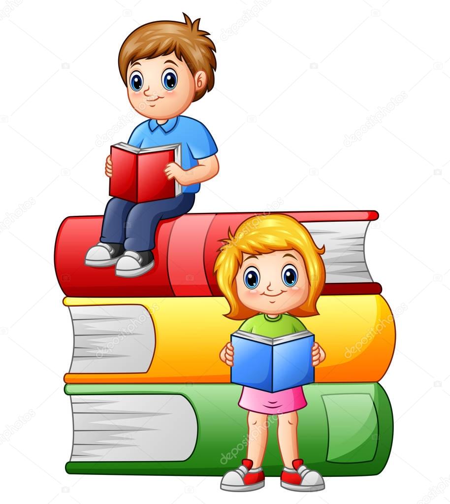 Happy school children with big books