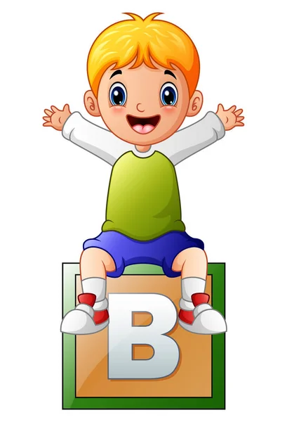 Маленький хлопчик сидить на кубику алфавіту — стоковий вектор