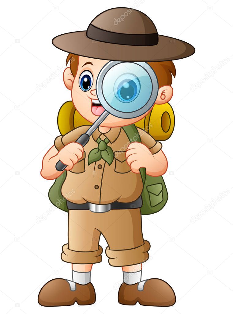 Boy explorer with magnifying glass